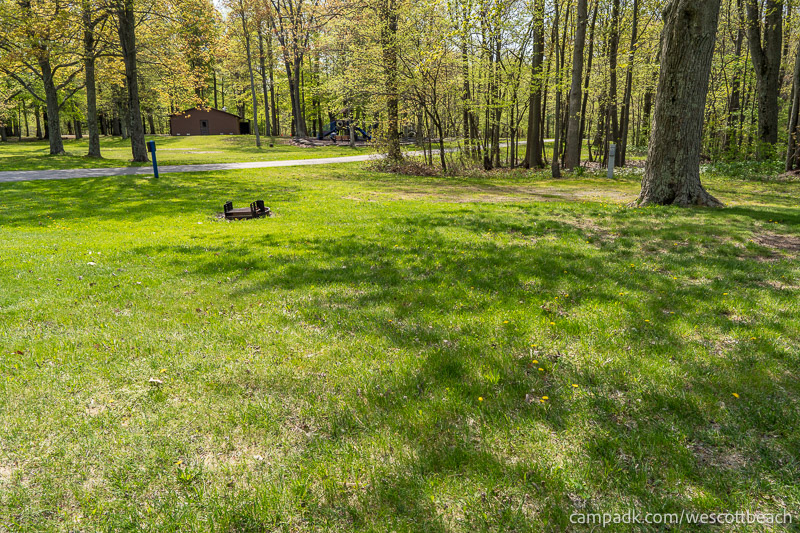 Campsite Photo of Site 123 at Westcott Beach State Park, New York - Looking at Site from Road Sign Visible