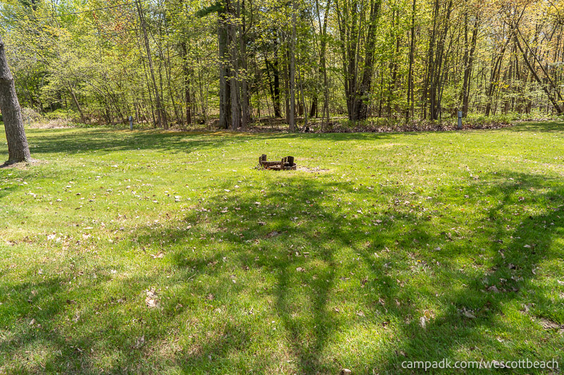 Campsite Photo of Site 15 at Westcott Beach State Park, New York - Looking at Site from Road Sign Visible